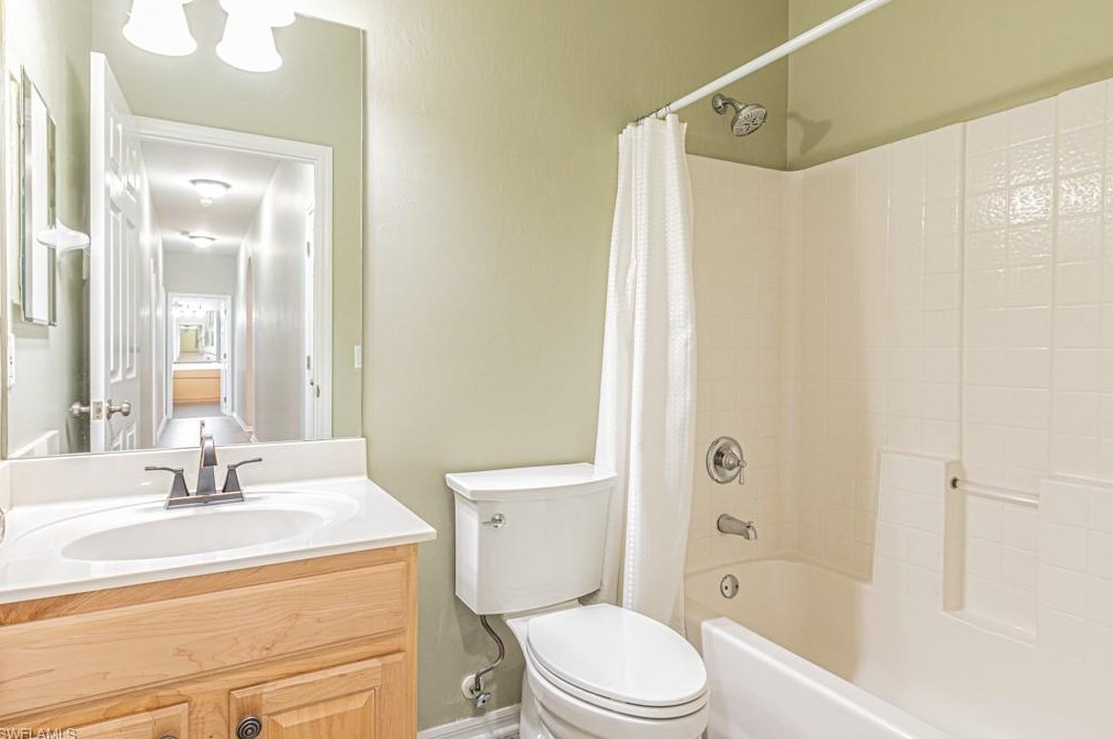 303 Burnt Pne Dr, Naples FL 34119-9773 exterior