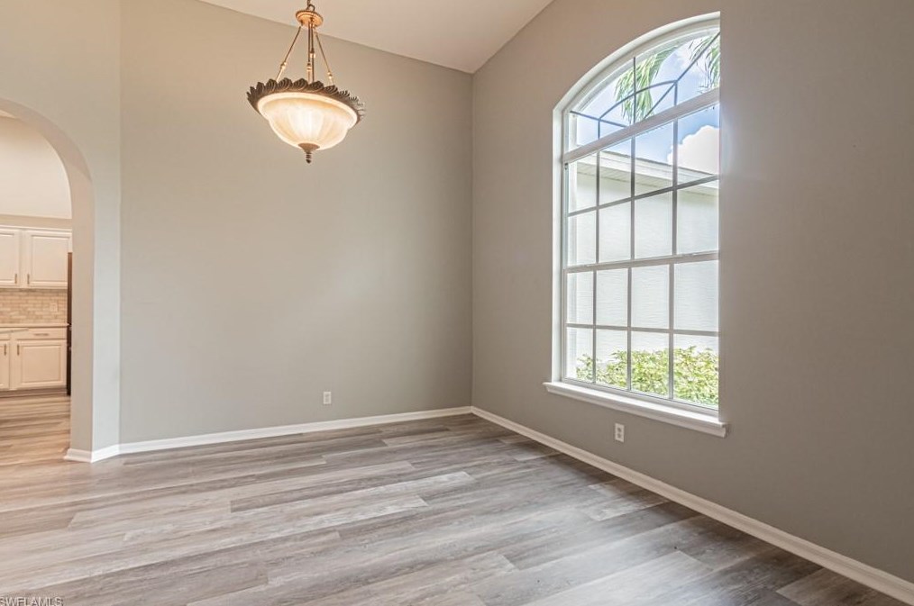 303 Burnt Pne Dr, Naples FL 34119-9773 exterior