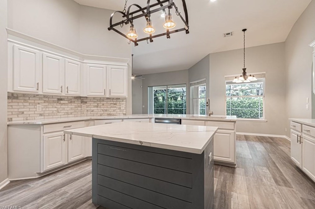 303 Burnt Pne Dr, Naples FL 34119-9773 exterior