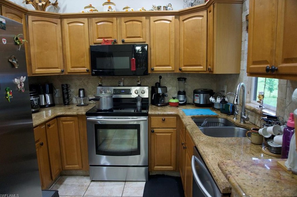 2407 Randall Blvd, Naples FL 34120-5577 exterior