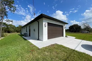 615 Addison St E, Lehigh Acres, FL 33974 - Photo 2