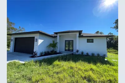 818 Chemstrand St E, Lehigh Acres, FL 33974 - Photo 1