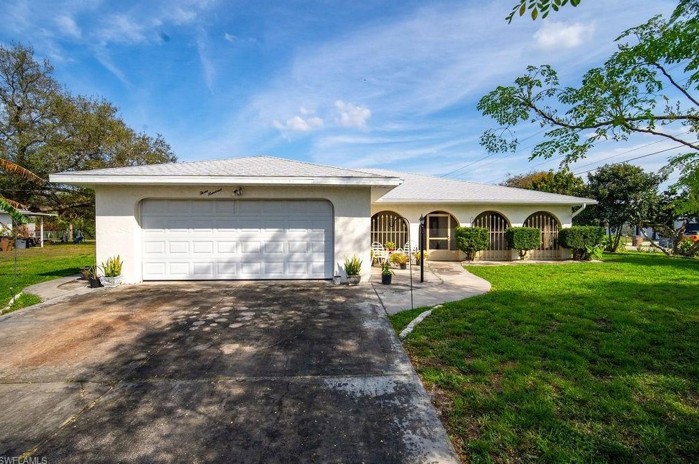 300 Thompson Ave, Lehigh Acres, FL 33936