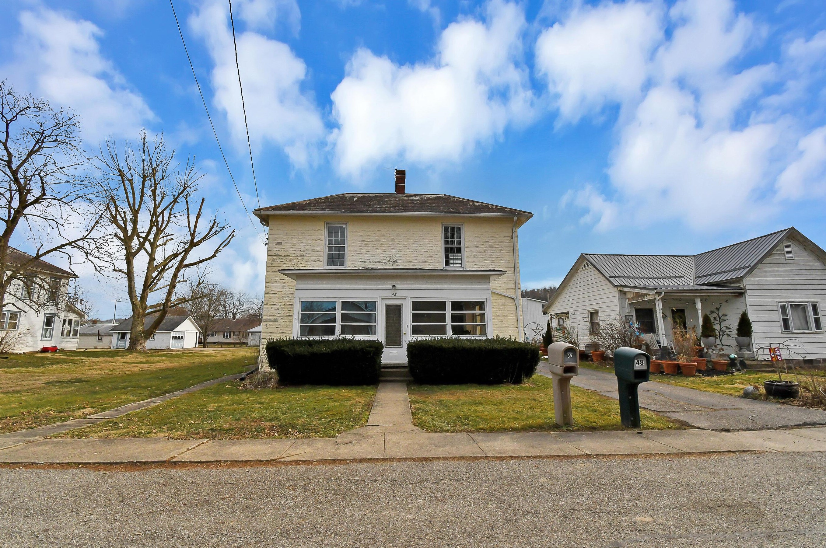 48 7th St, Adams Mills, OH 43821-9301