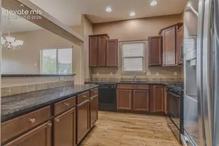 7027 Davey Crocket Court, Colorado Springs, CO 80922 - Photo 2