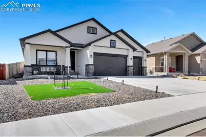 7030 Bigtooth Maple Drive, Colorado Springs, CO 80925 - Photo 2