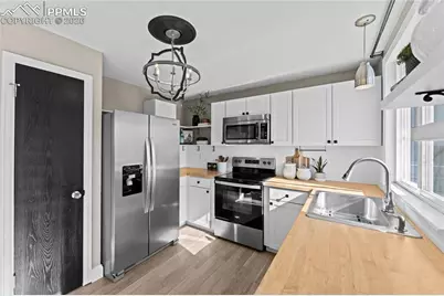 1945 Harwood Circle, Colorado Springs, CO 80916 - Photo 6