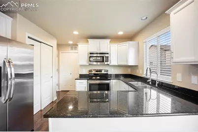 6185 Wood Bison Trail, Colorado Springs, CO 80925 - Photo 8