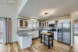 9470 Blue Grass Pl, Colorado Springs, CO 80925 - Photo 2