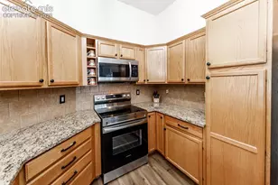 1590 Little Bear Creek Point, Colorado Springs, CO 80904 - Photo 16