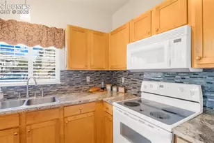 6944 Ash Creek Heights, Colorado Springs, CO 80922 - Photo 12