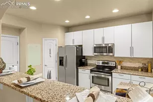 6569 Tranters Creek Way, Colorado Springs, CO 80925 - Photo 18