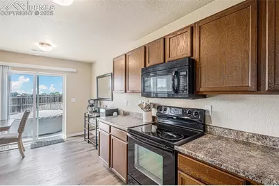 9455 Sand Myrtle Drive, Colorado Springs, CO 80925 - Photo 14