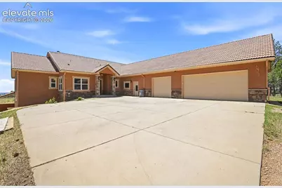 7601 Rushing Wind Grove, Colorado Springs, CO 80908 - Photo 4