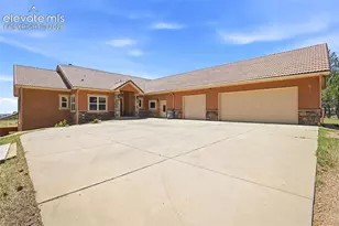 7601 Rushing Wind Grove, Colorado Springs, CO 80908 - Photo 4