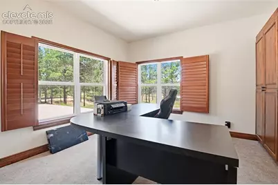 7601 Rushing Wind Grove, Colorado Springs, CO 80908 - Photo 18