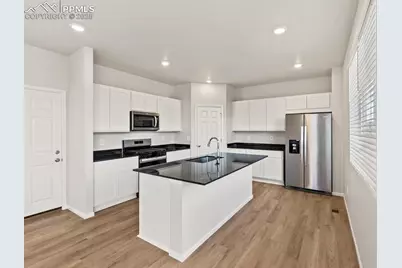 10783 Rolling Ranch Drive, Peyton, CO 80831 - Photo 8