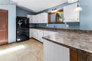 1129 Forest Hill Rd, Woodland Park, CO 80863 - Photo 8