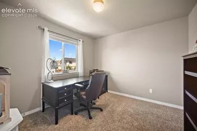 10061 Thunderbolt Trail, Colorado Springs, CO 80925 - Photo 24