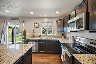 10061 Thunderbolt Trail, Colorado Springs, CO 80925 - Photo 10