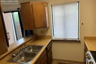 879 London Green Way, Colorado Springs, CO 80906 - Photo 12