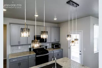 6708 Wiper Way, Colorado Springs, CO 80925 - Photo 14