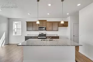 11739 Reagan Rdg Dr, Colorado Springs, CO 80925 - Photo 6