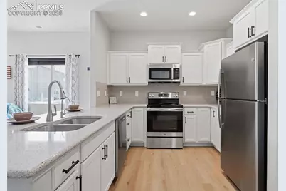 6295 White Wolf Point, Colorado Springs, CO 80925 - Photo 12