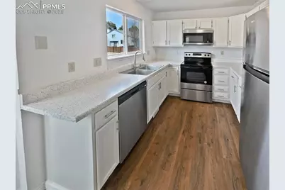 4690 Badlands Court, Colorado Springs, CO 80922 - Photo 6