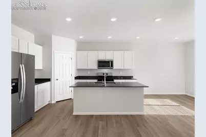 11379 Pikeminnow Place, Colorado Springs, CO 80925 - Photo 6