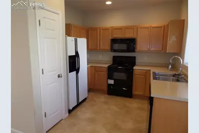 2163 Squawbush Ridge Grove, Colorado Springs, CO 80910 - Photo 12