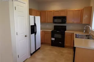 2163 Squawbush Ridge Grove, Colorado Springs, CO 80910 - Photo 12