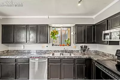 7385 Powderwash Drive, Colorado Springs, CO 80911 - Photo 12