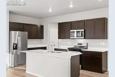 6786 Roundtail Way, Colorado Springs, CO 80925 - Photo 2