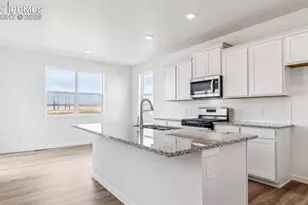 11643 Reagan Rdg Dr, Colorado Springs, CO 80925 - Photo 10