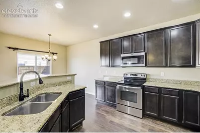 6570 Tranters Creek Way, Colorado Springs, CO 80925 - Photo 14