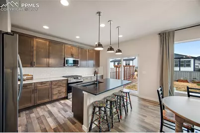 8274 Harvey Logan Drive, Colorado Springs, CO 80908 - Photo 10