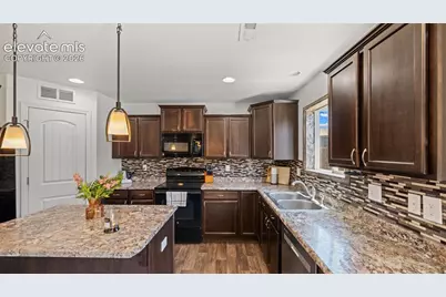 9559 Desert Lily Circle, Colorado Springs, CO 80925 - Photo 8