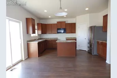 6733 Liberator Trail, Colorado Springs, CO 80925 - Photo 2