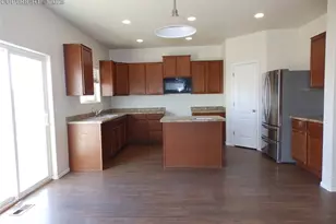 6733 Liberator Trl, Colorado Springs, CO 80925 - Photo 2