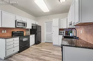 1590 Little Bear Creek Point, Colorado Springs, CO 80904 - Photo 10