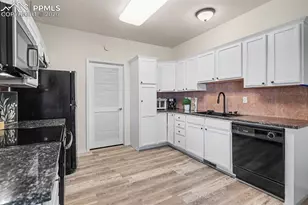 1590 Little Bear Creek Point, Colorado Springs, CO 80904 - Photo 12