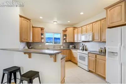 13616 Paradise Villas Grove, Colorado Springs, CO 80921 - Photo 22