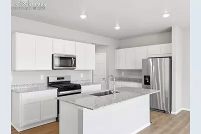 11403 Pikeminnow Place, Colorado Springs, CO 80925 - Photo 6