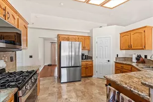 6977 Kourie Way, Oak Hills, CA 92344 - Photo 10