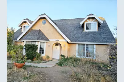 8021 Macron Street, Oak Hills, CA 92344 - Photo 1