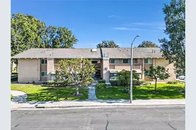 8788 Coral Springs Court #5 (201E), Huntington Beach, CA 92646 - Photo 1