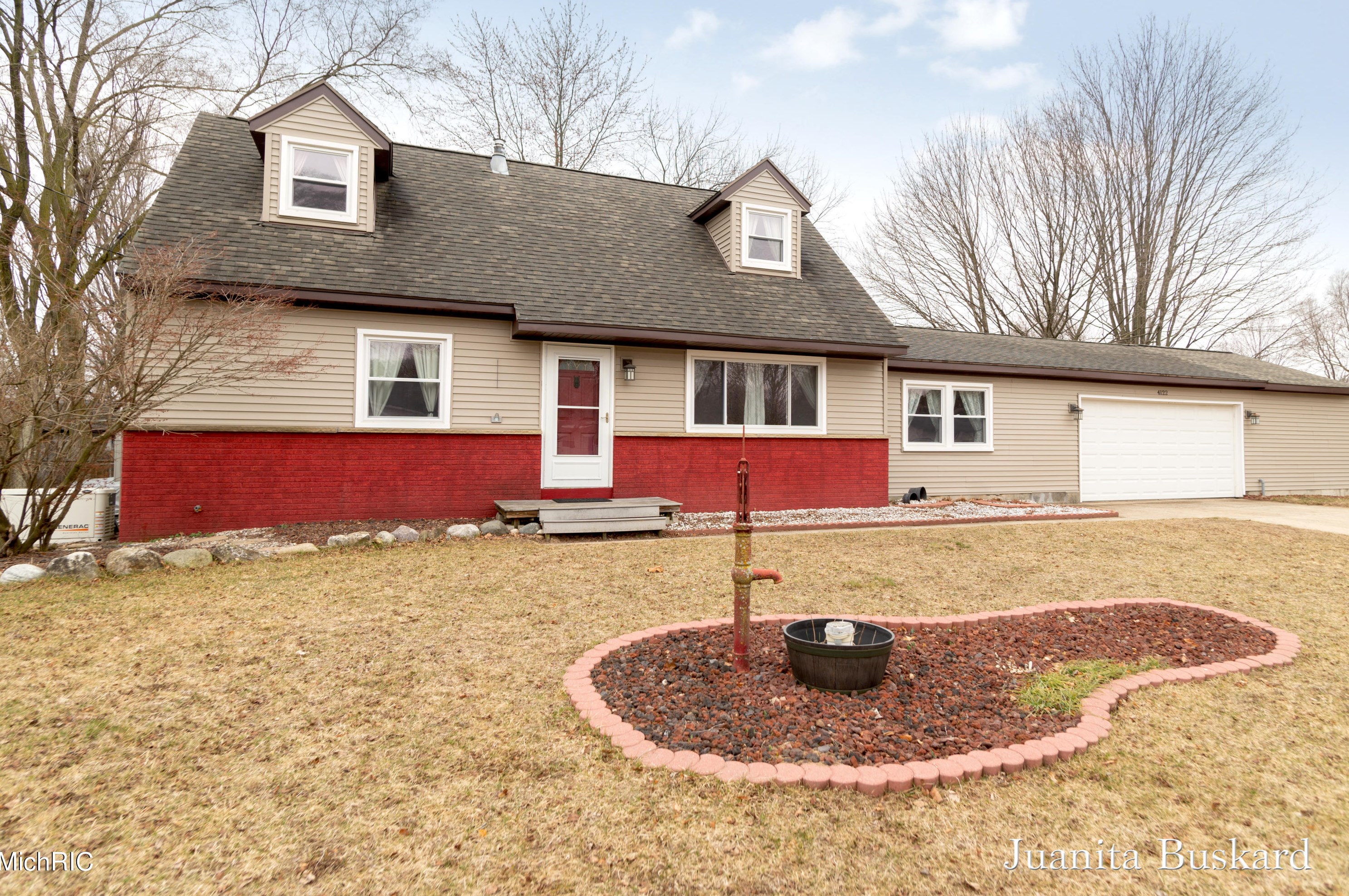 4122 Sandy Dr, Dorr, MI 49323-9422
