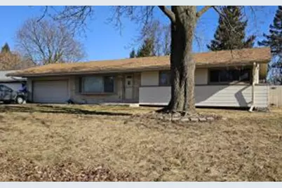 7710 N Edgeworth Dr, Milwaukee, WI 53223 - Photo 1