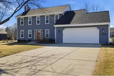 W141N10625  Wooded Hills Dr, Germantown, WI 53022 - Photo 1